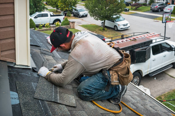 Professional Roofing technician working in Norwood, NC